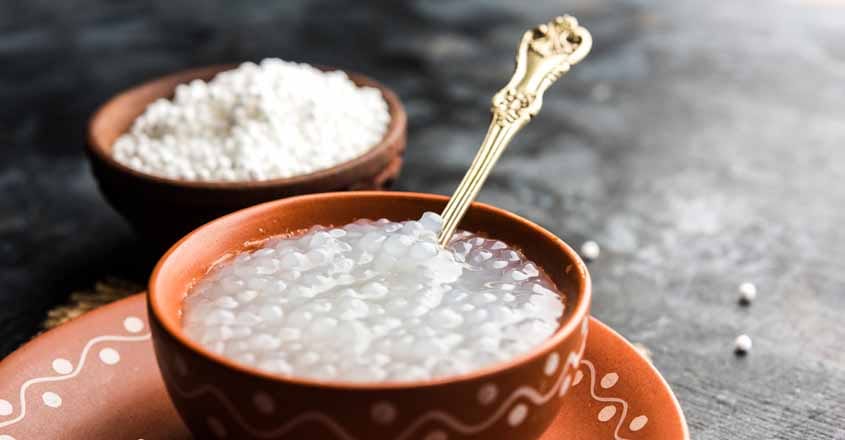 SabudanaPorridge Sago or Sabudana Porridge Recipe for Babies and Toddlers, served in a bowl with spoon, selective focus